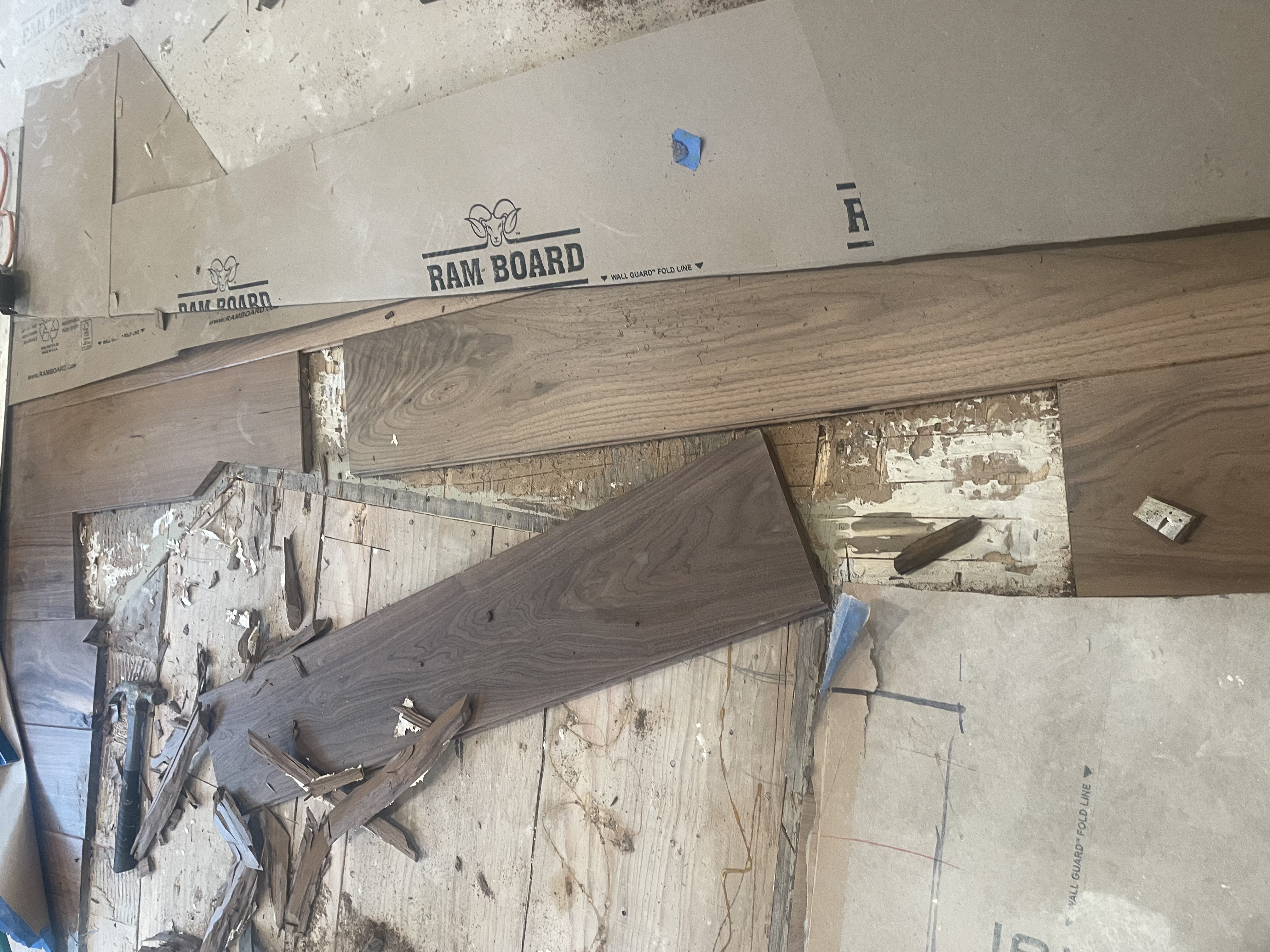 Hardwood floor board replacement in progress