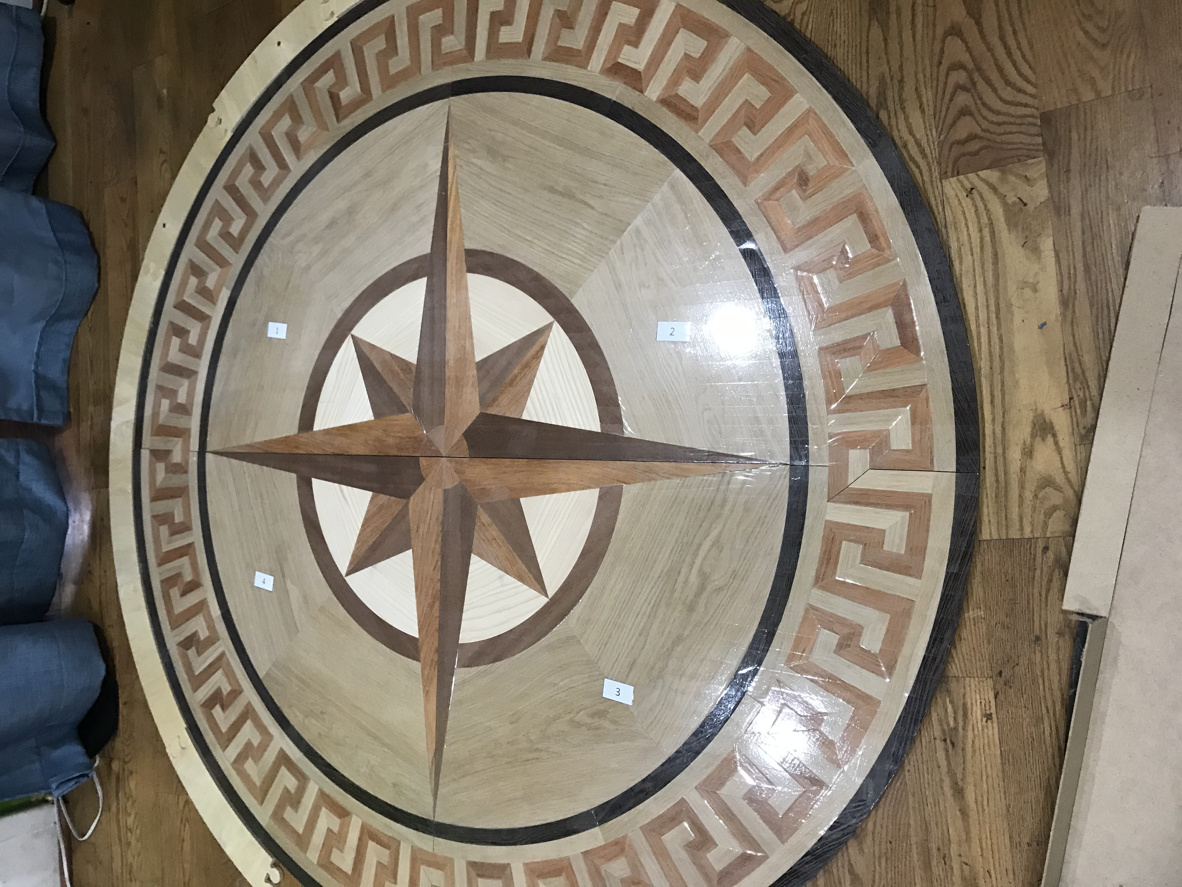 Custom hardwood floor medallion Los Angeles entry design