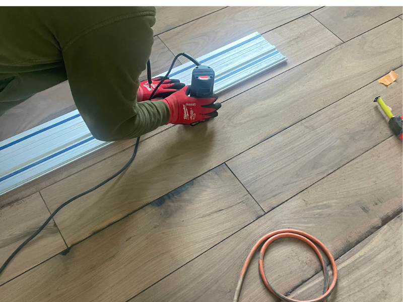Dark stained hand scraped walnut hardwood floors with custom color in Los Angeles kitchen