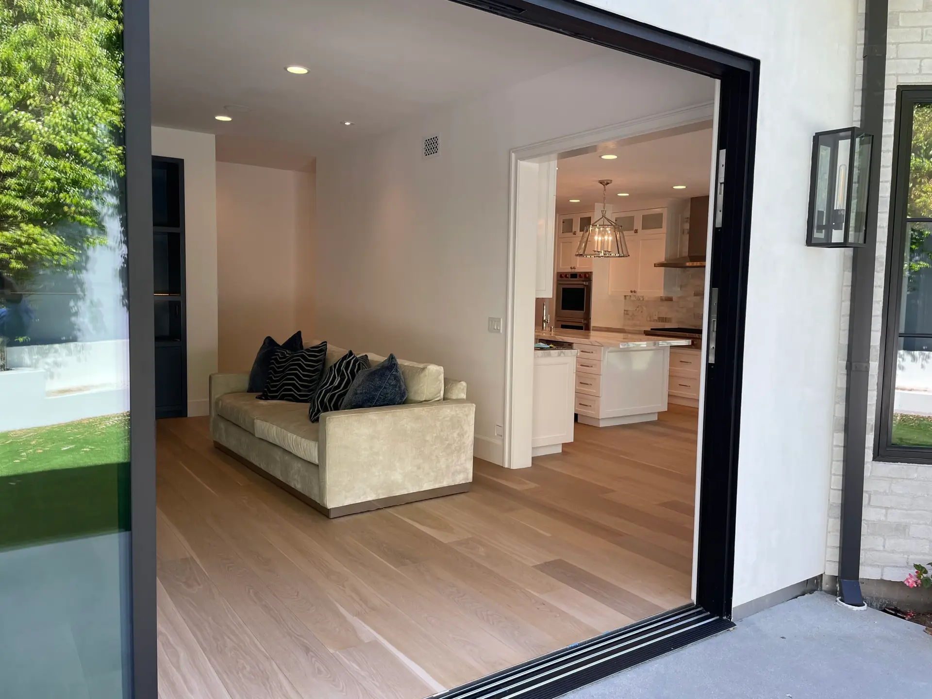 Legnohardwood premium hardwood flooring installed in a luxury home office in San Diego with a scenic view.