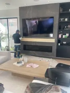 Img9507 Wood Floors La | Legno Hardwood Llc "Legno Hardwood Professional Installing Walnut Hardwood Floors - Expert Craftsmanship and Custom Finish"